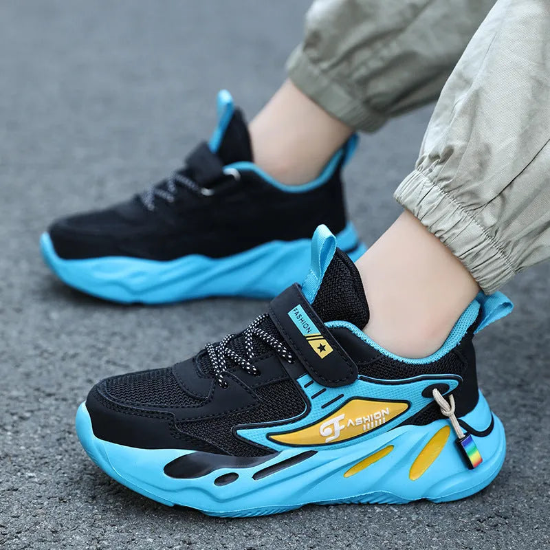 Boys' platform sports running shoes in dark blue with Velcro strap and mesh upper.