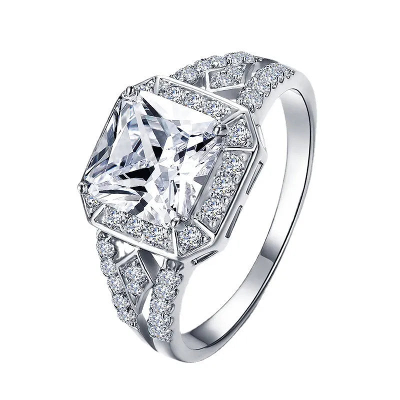 Platinum geometric zircon ring with hollow quadrilateral design on copper base