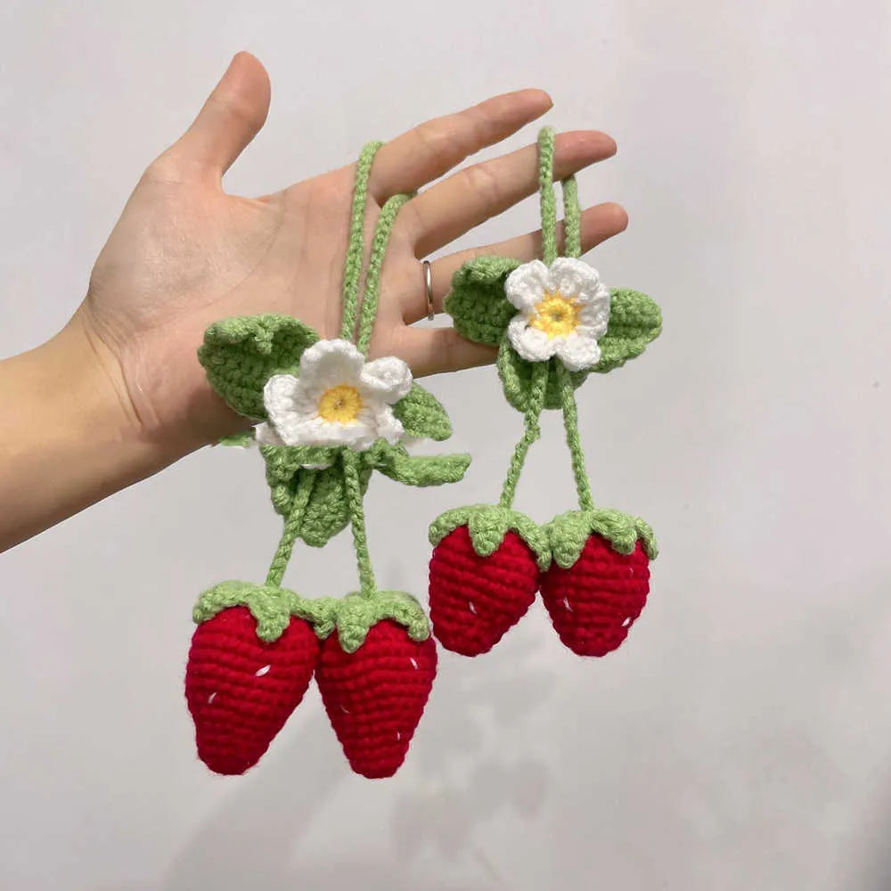 Handmade knitted strawberry shaped car hanging ornament made from cotton and hemp fibres