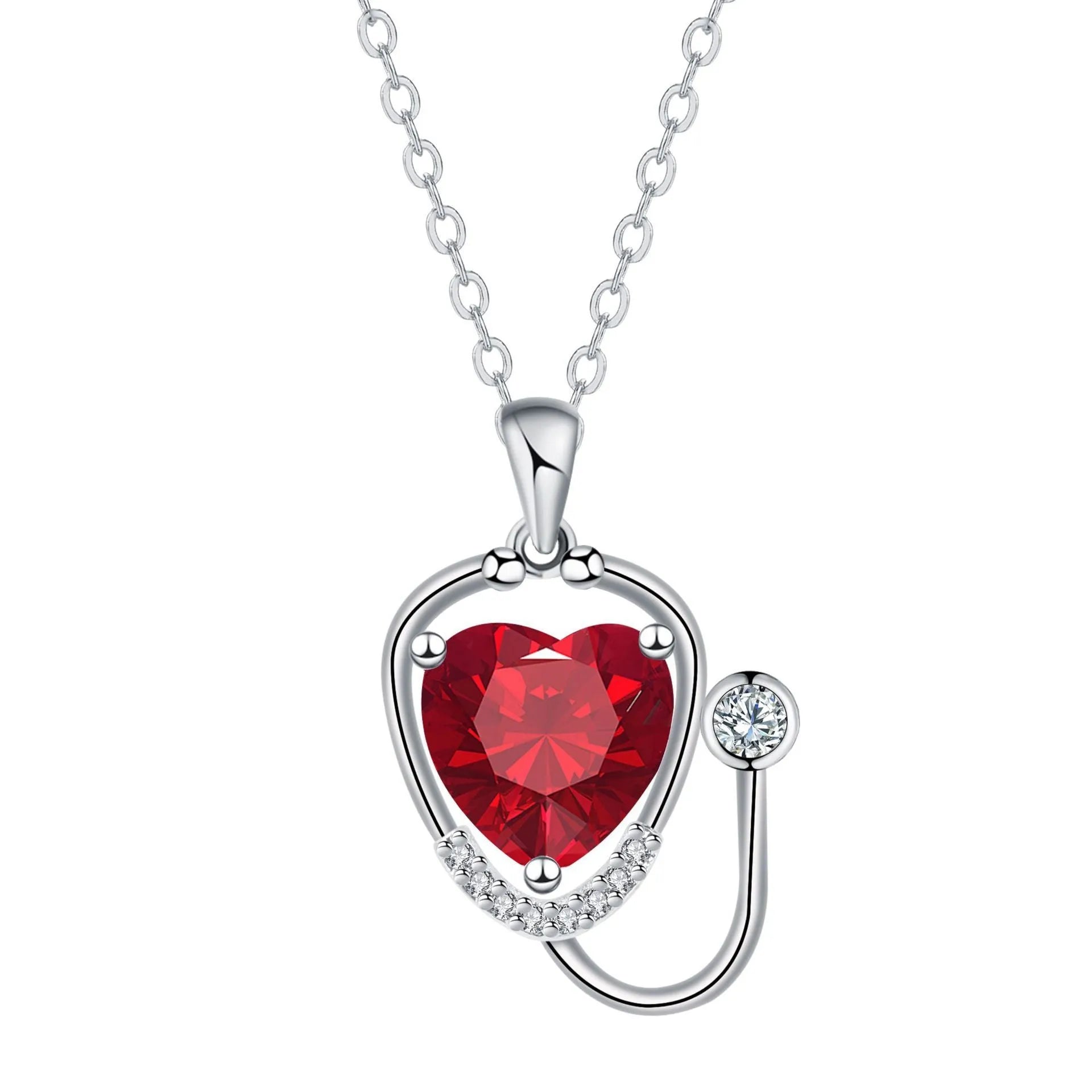 Red diamond coloured women's necklace with wings, cross, and stethoscope pendant.