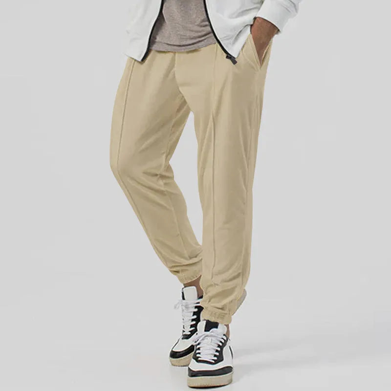Men's grey cotton blend track sweatpants with straight-leg design and mid waist