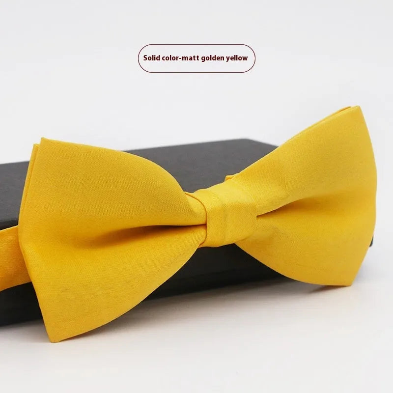 Men's flat head solid colour bow tie in polyester, showing 12cm by 6cm size on a background.