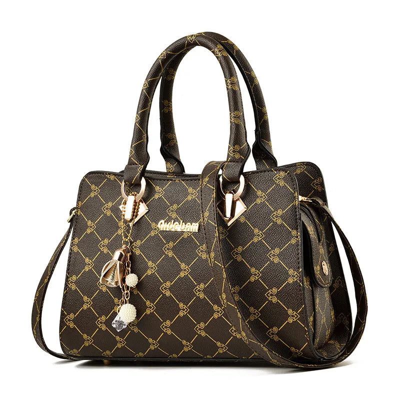 Geometric pattern ladies messenger bag in textured PU leather with zipper closure and interior card slots