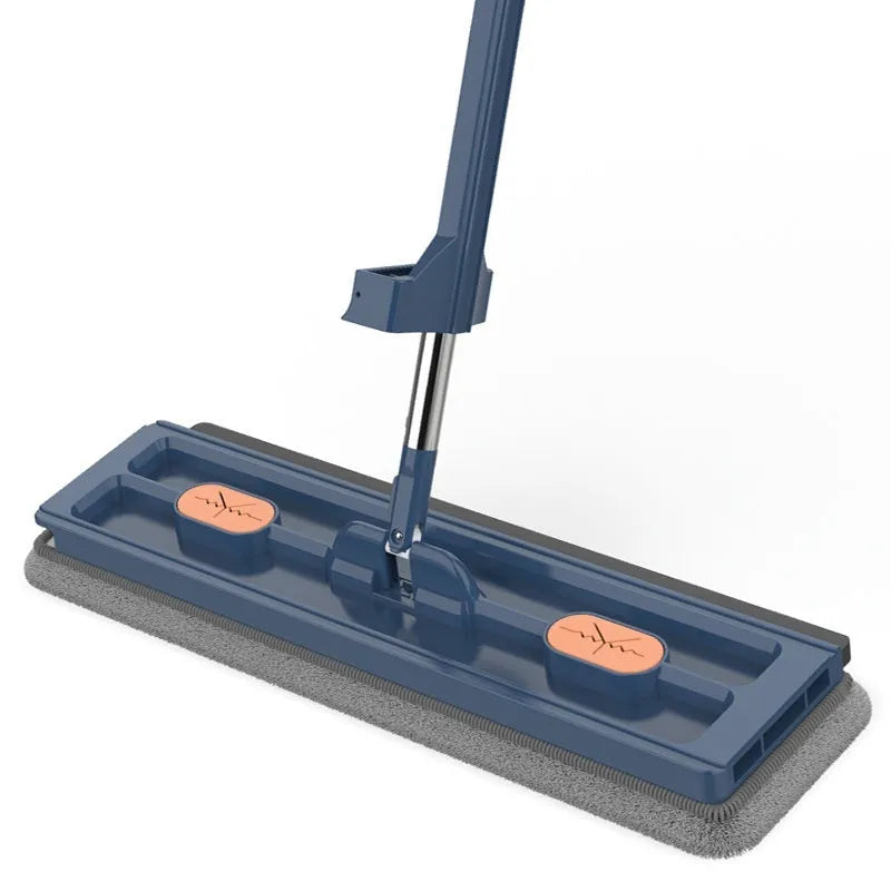 Large flat mop with long stainless steel handle and blue cleaning cloth on hard floor