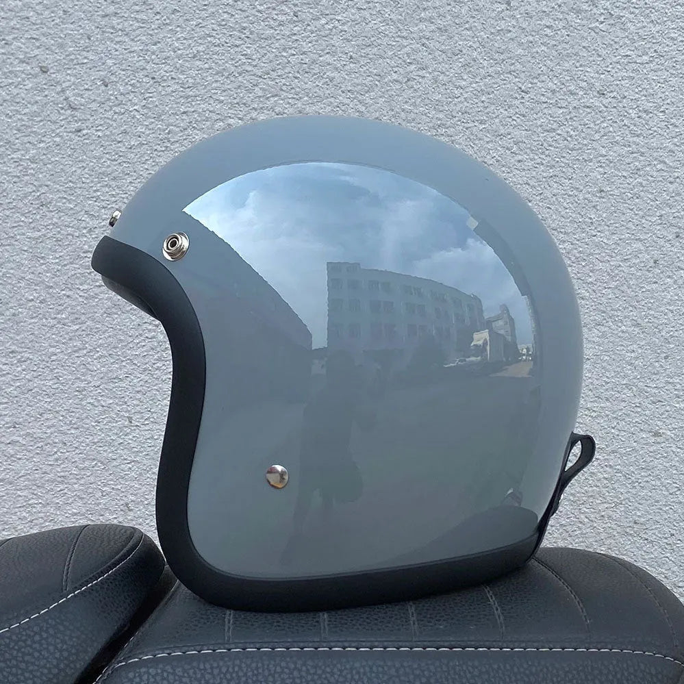 FRP retro-style half motorcycle helmet shown in a cement grey colour variant.