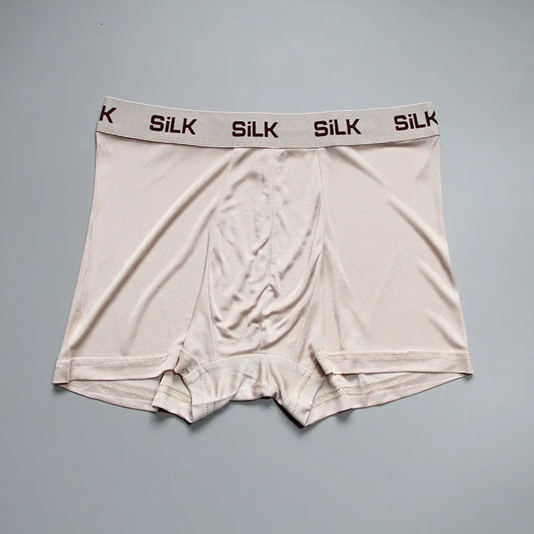 Men's silk shorts in loose fit with mid waist, available in navy blue, silver grey or skin colour