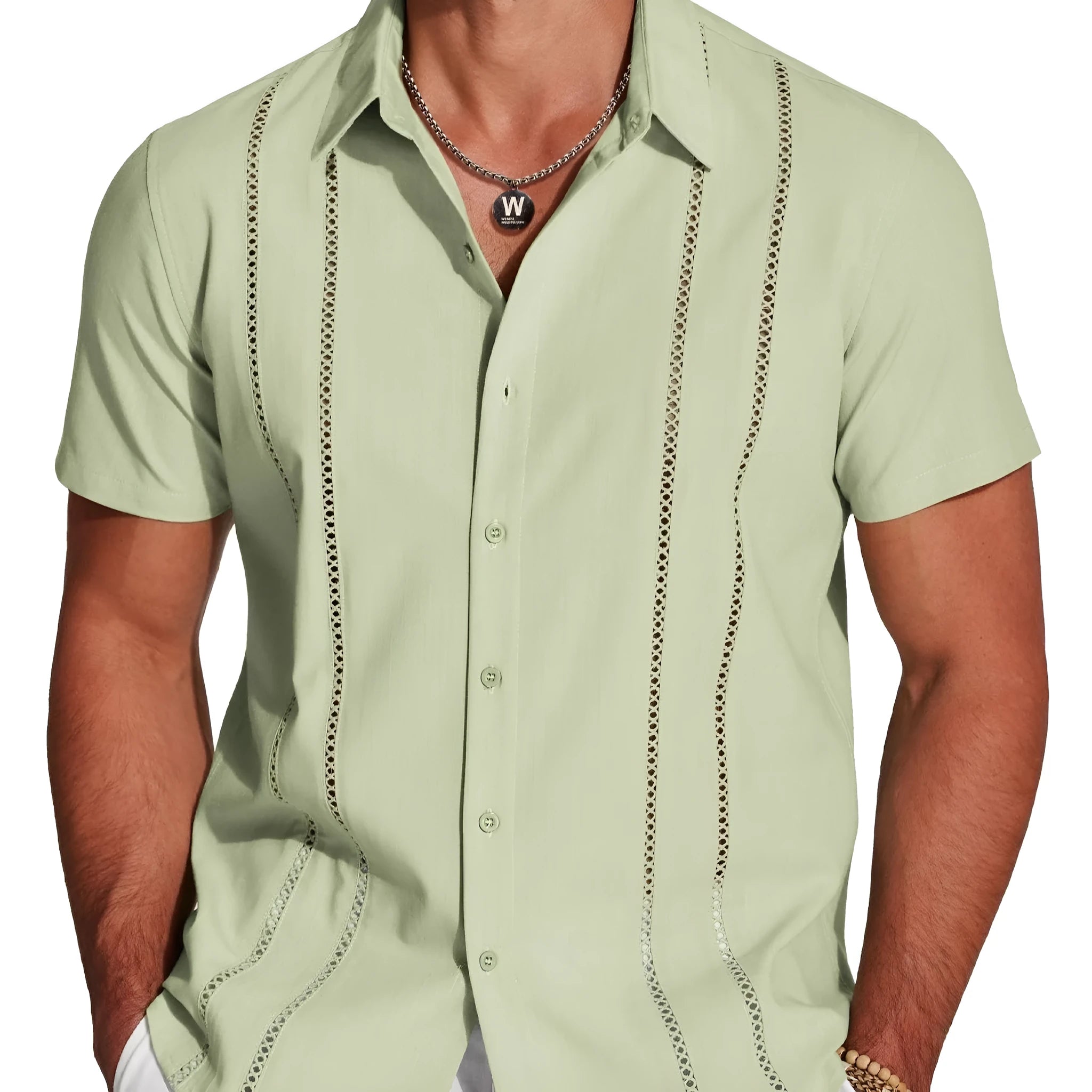 Man wearing a slim fit, short sleeve Hawaiian shirt with a digital print pattern in a casual setting.
