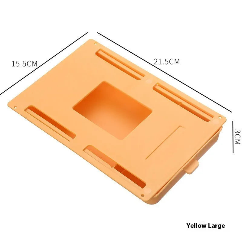 White plastic adhesive under desk storage drawer box with a lid and internal divider grid for organisation.