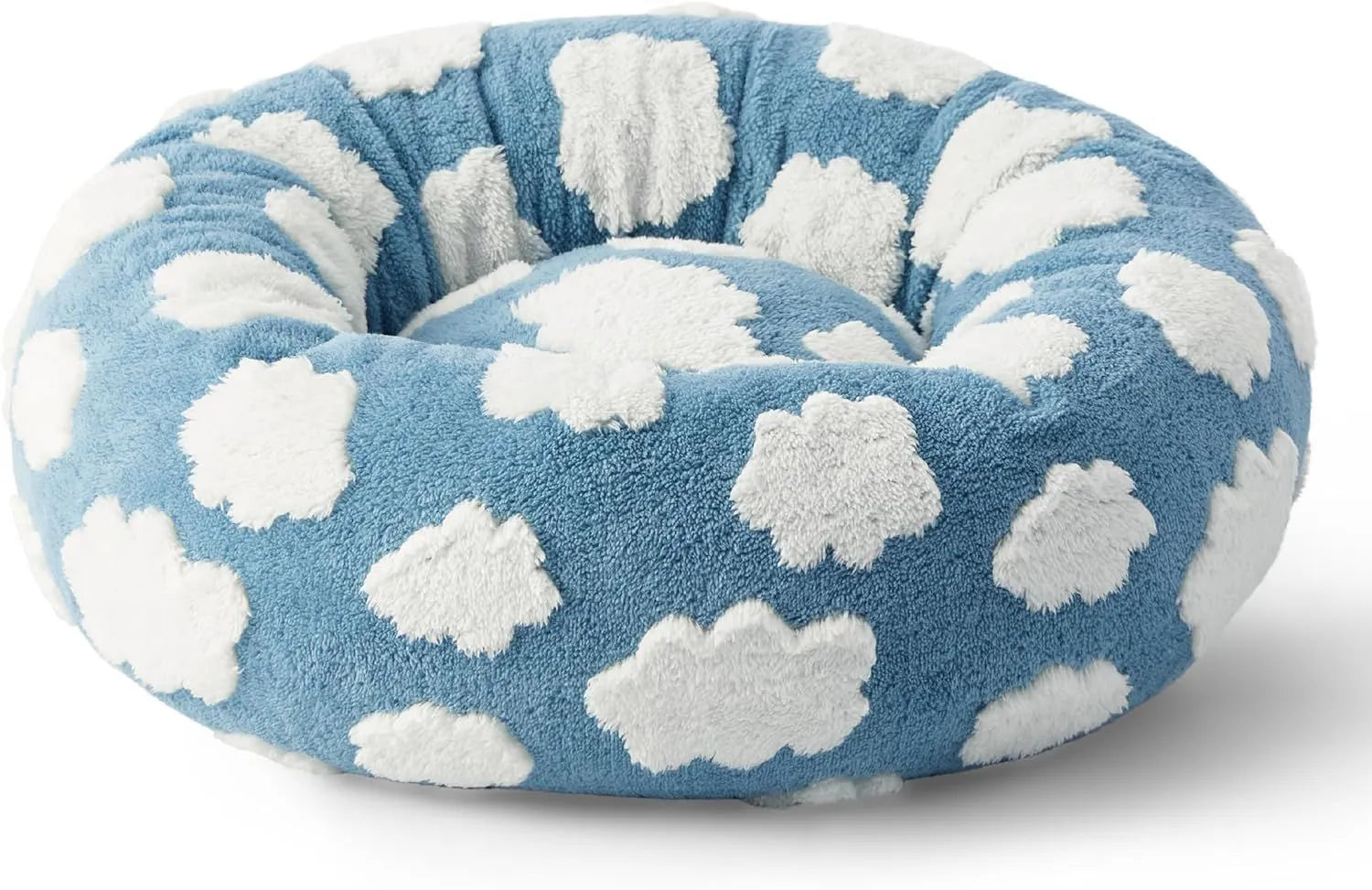 Round blue and white plaid dog bed with a removable cover on a plastic base.