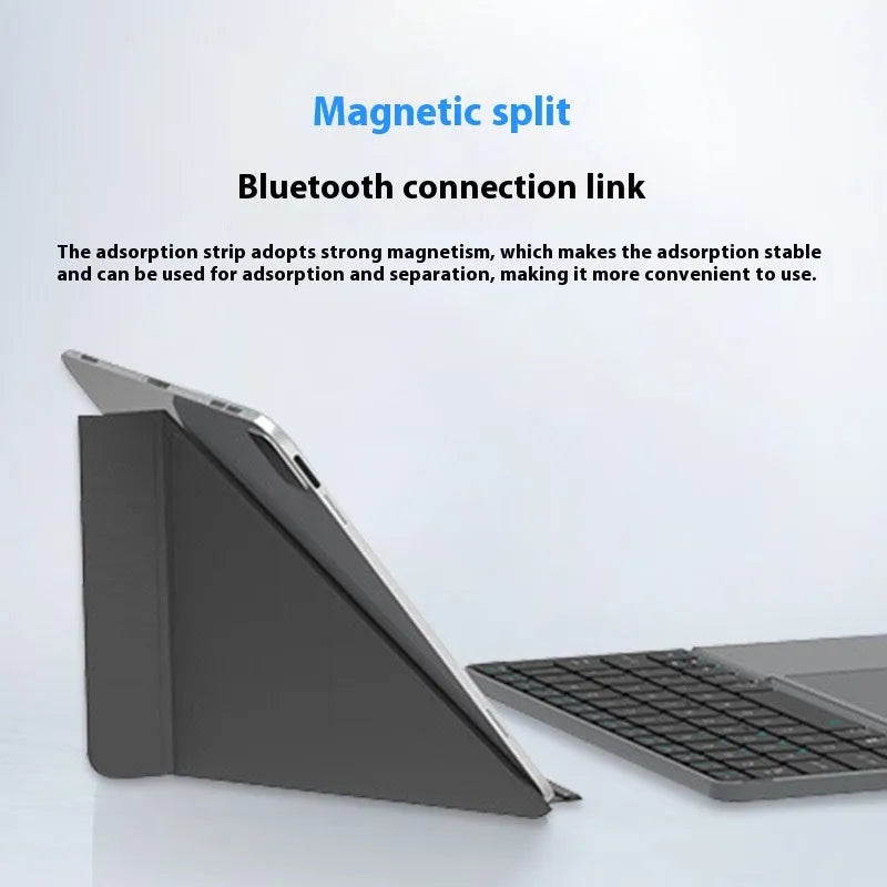 Grey folding Bluetooth keyboard for phablet and tablet devices showing compact folded position