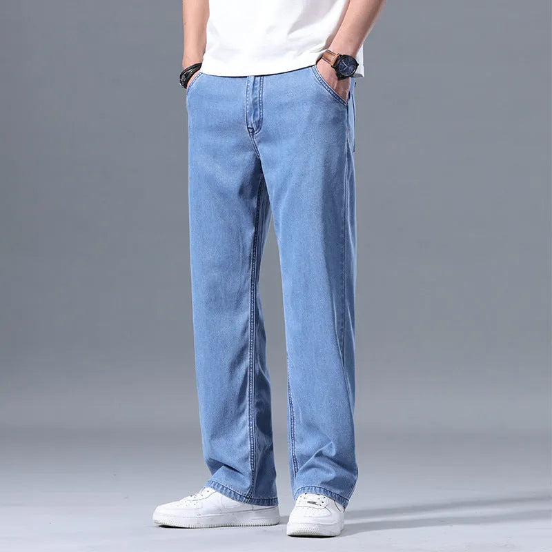 Men's loose straight-leg lyocell jeans in light blue with zipper fly closure
