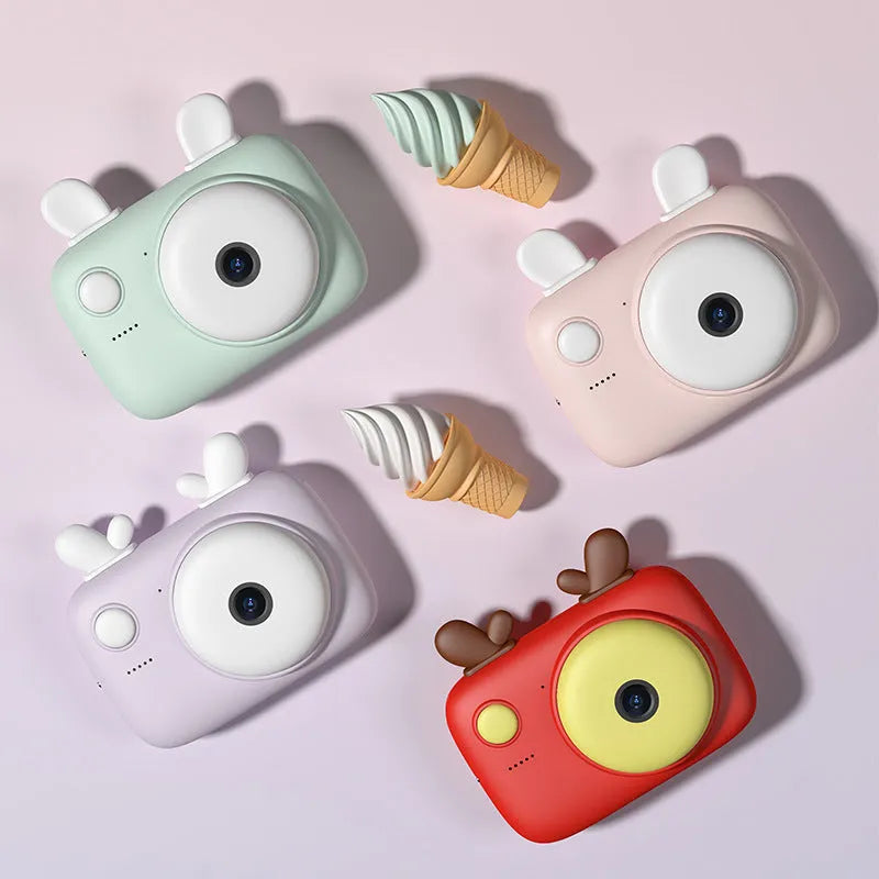A2 Kids Macaron Mini SLR digital camera in colour, showing front and rear 40MP cameras and 2.4-inch screen.