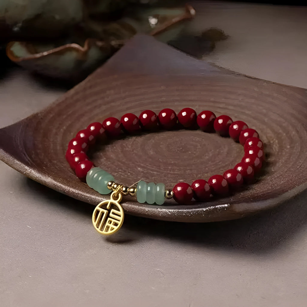 Handmade wave-shaped bracelet with alternating cinnabar and copper beads.