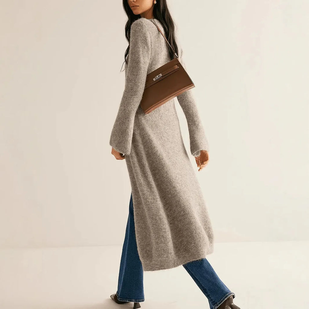 Khaki coloured women's long sleeve button-front cardigan coat in a French retro style.