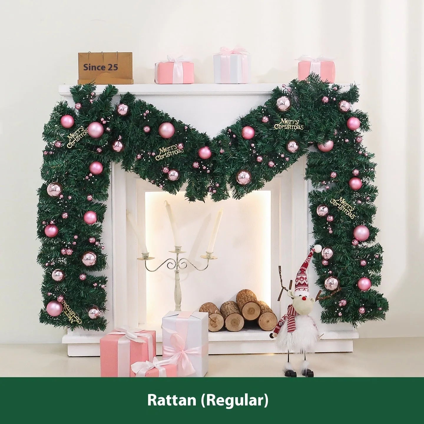 2.7 metre pink small fruit Christmas rattan garland with wrought iron frame draped along wall
