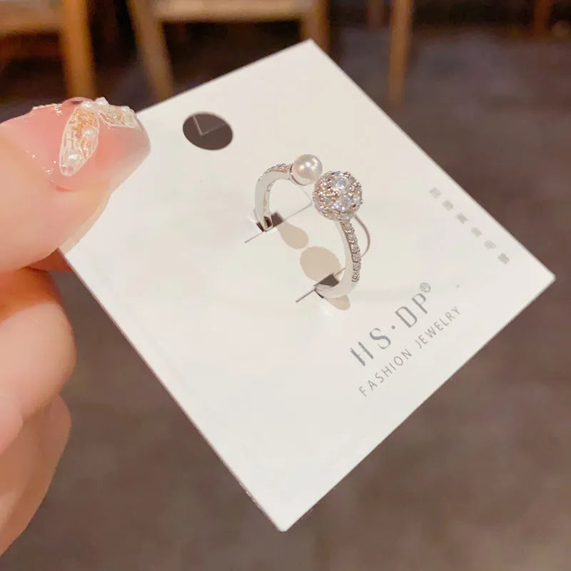 Women's round zircon open-end ring in gold or silver colour with real gold plating