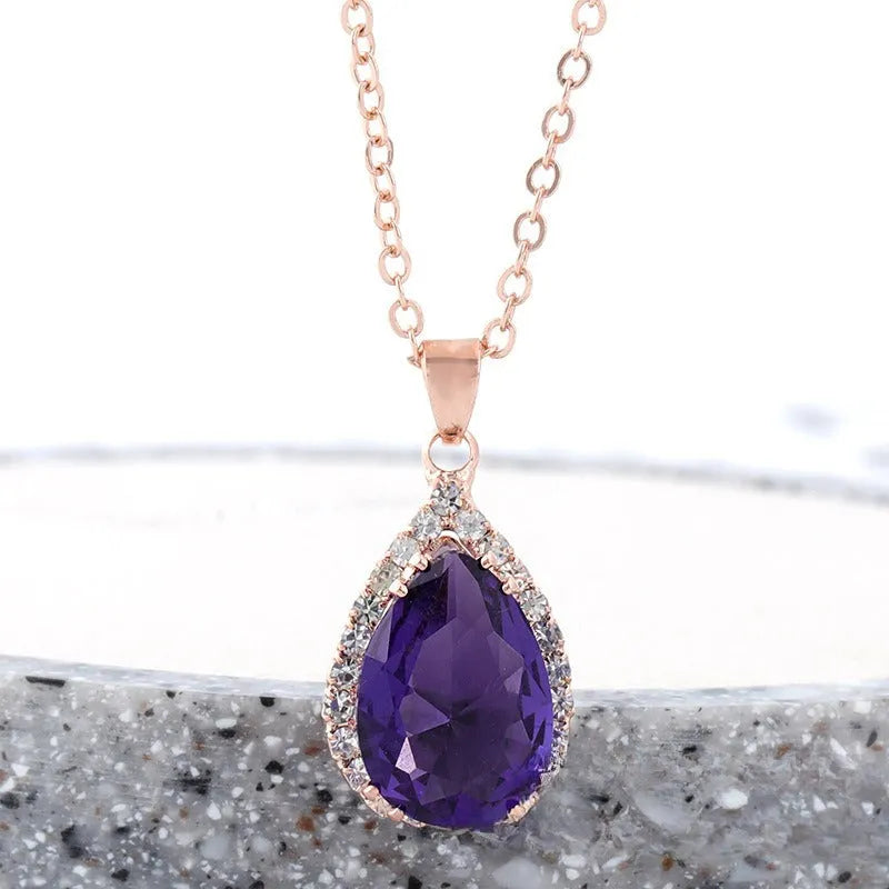 Drop shape geometric pendant necklace with rhinestone inlay in pink rose gold electroplated finish