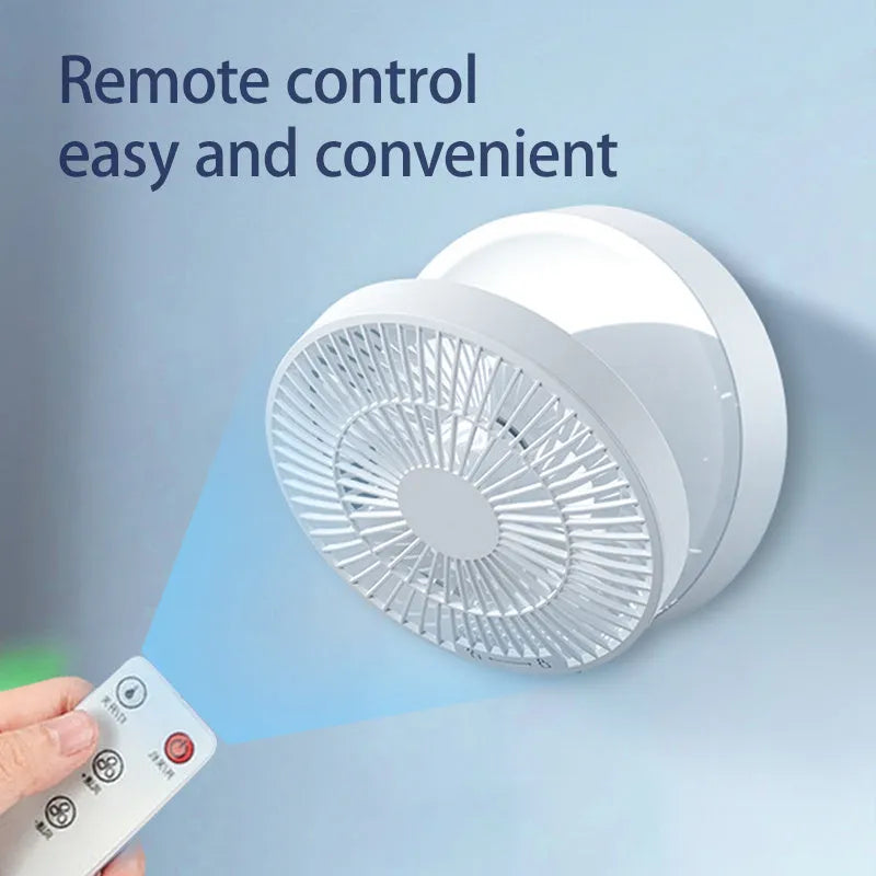 White USB rechargeable folding fan with remote control on a desk, showing 90° adjustable head and night light