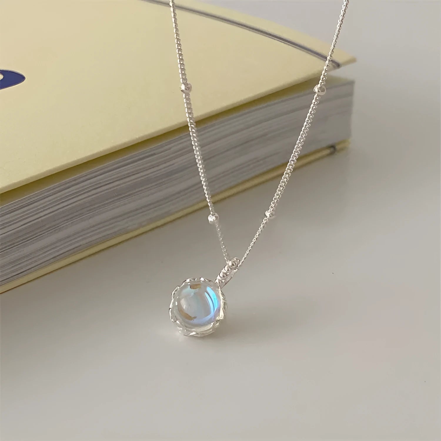 Silver 925 sterling silver necklace with geometric ornamental stone pendant on adjustable curb chain