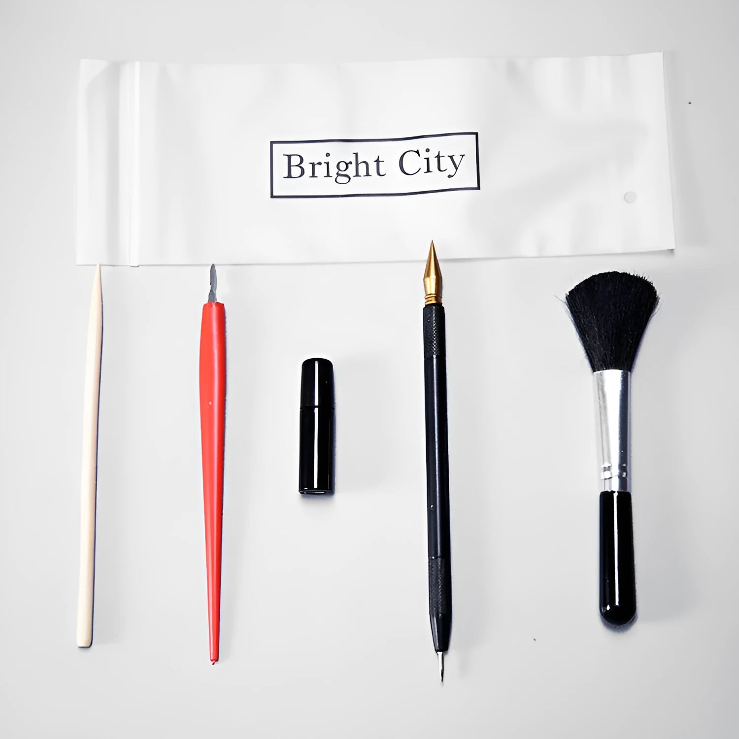 Scraping painting tool set with scratch pens, small scrapers, and white card paper for texture art