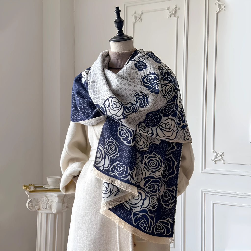 Grey imitation cashmere winter scarf with tassels laid flat, showing its long rectangular shape.