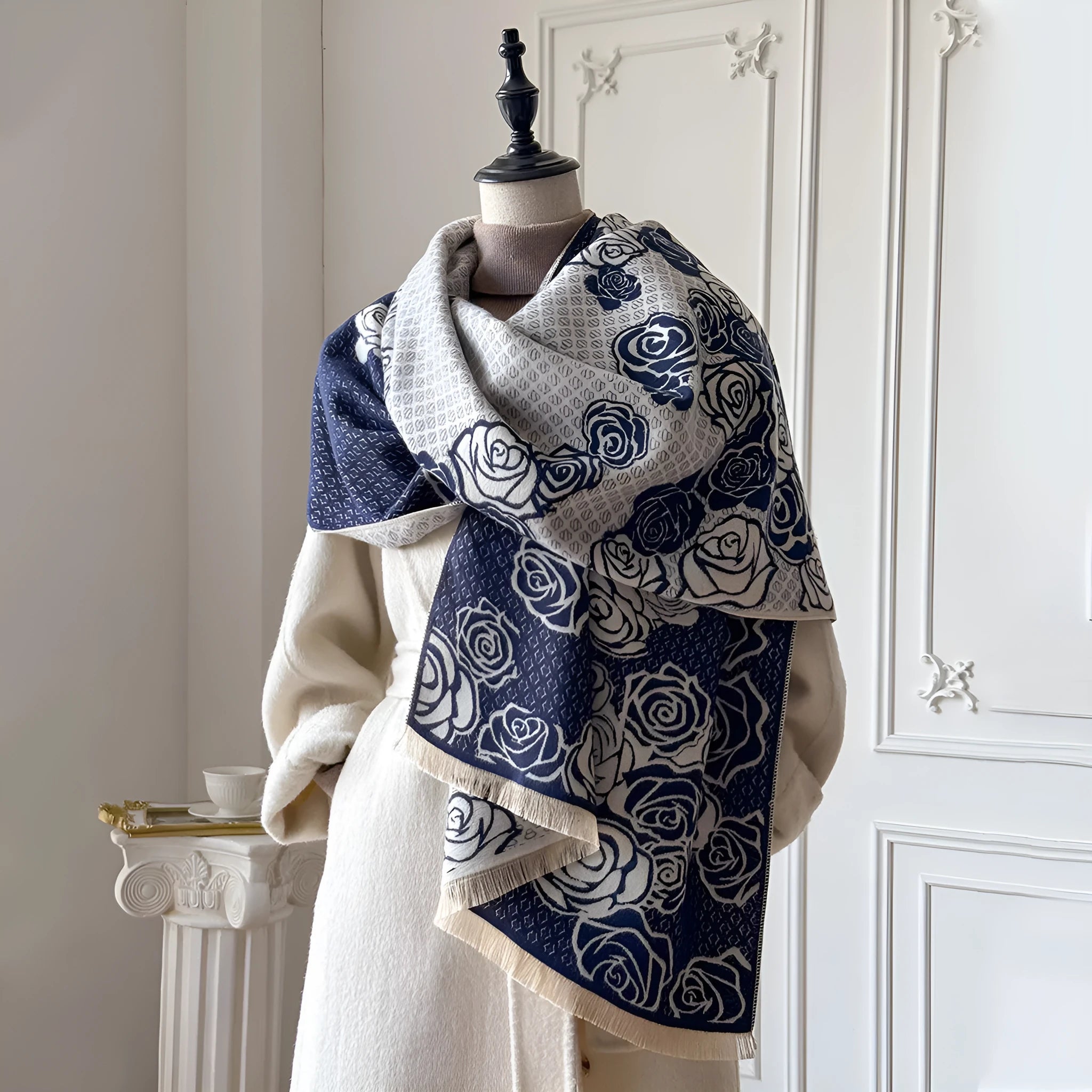 Grey imitation cashmere winter scarf with tassels laid flat, showing its long rectangular shape.
