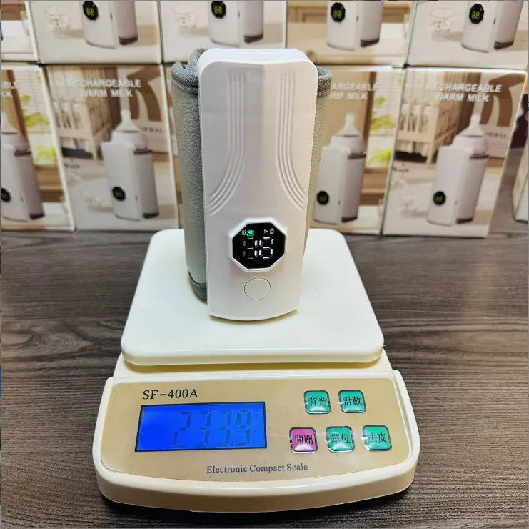 Grey and white portable car charger electric milk warmer for baby bottles