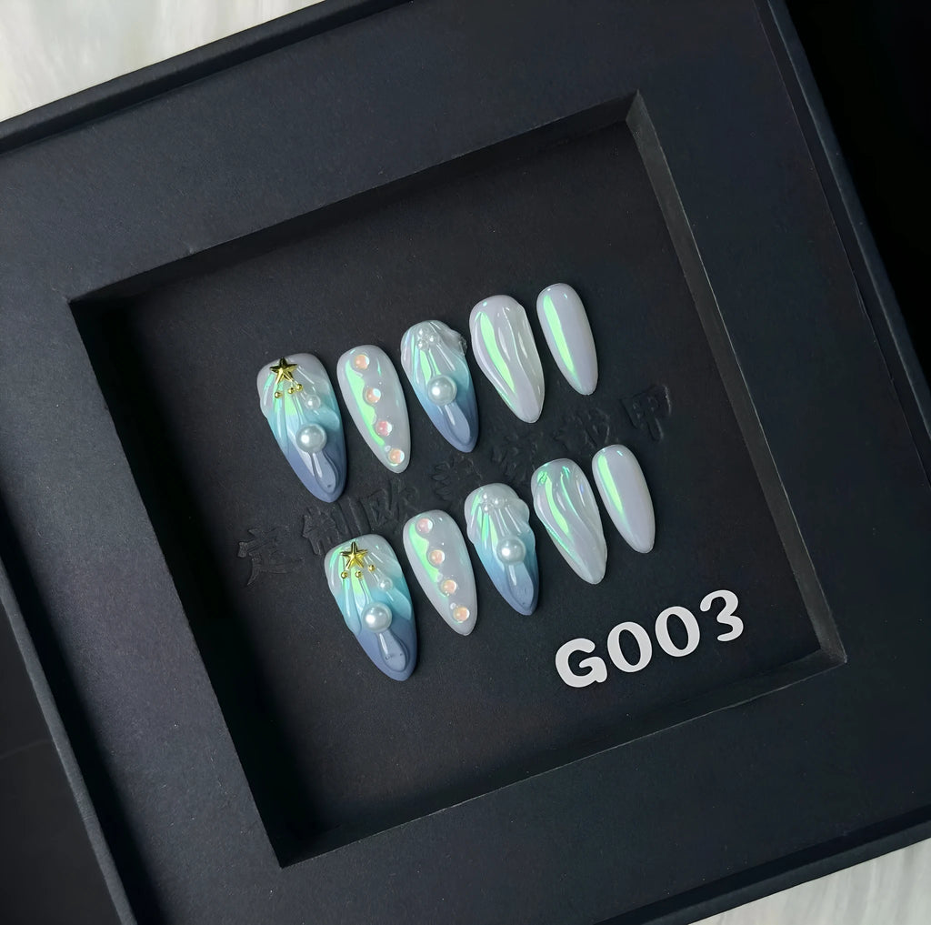 Blue plastic nail tip shells in four sizes for nail extensions and decorative manicures