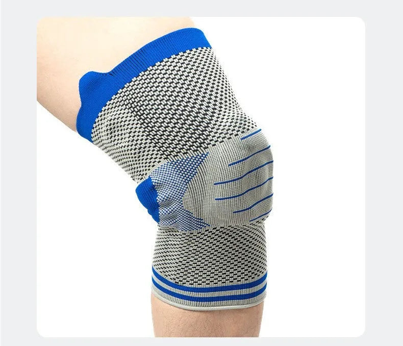 Cotton knee pad with silicone spring bar shock absorber in a two-tone colour scheme, shown in M, L, or XL size.