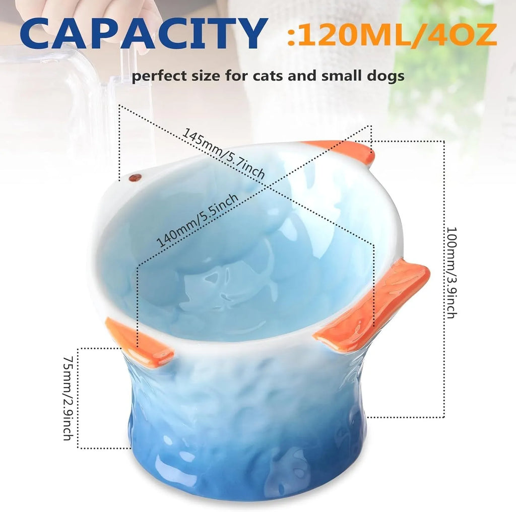 Set of four blue fish-shaped ceramic cat bowls with tilted design and elevated base