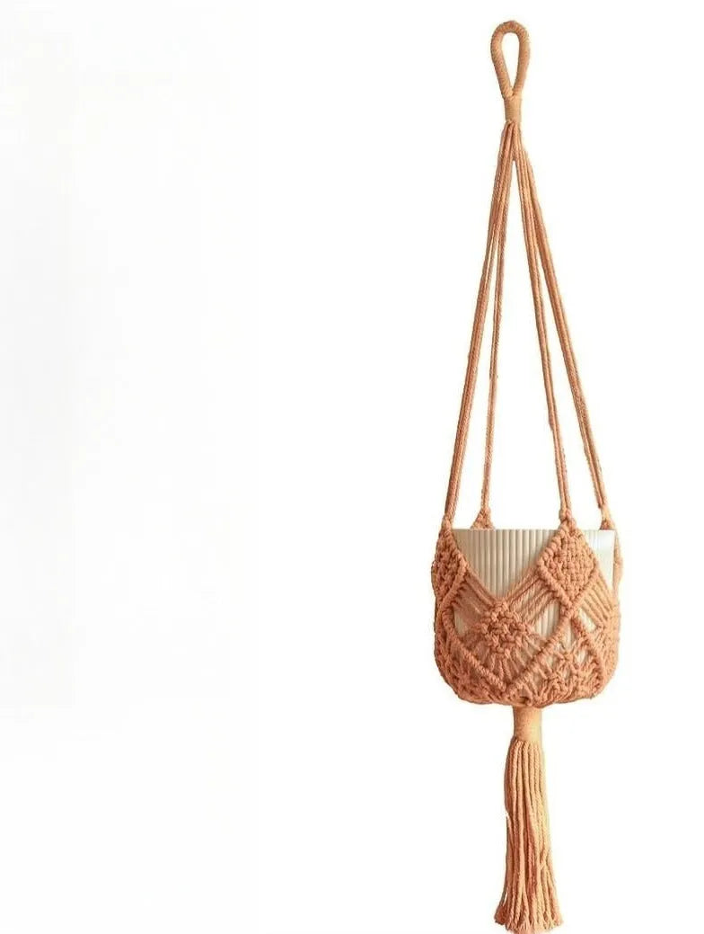 Hand-woven brown polyester cotton flower pot cover with a net pocket on the side.