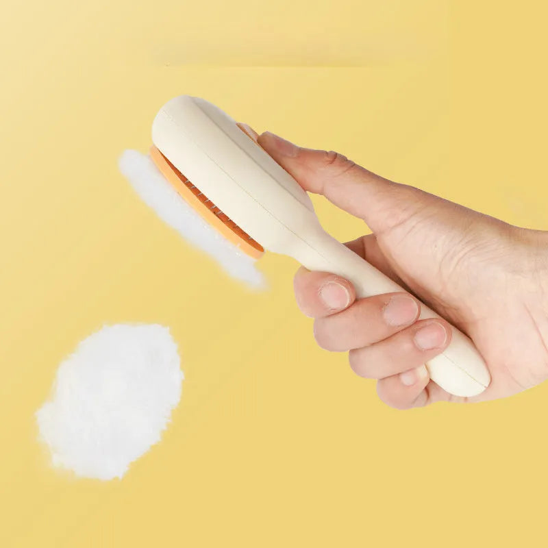 Stainless steel pet grooming brush with a coloured non-slip plastic handle for cats and dogs.