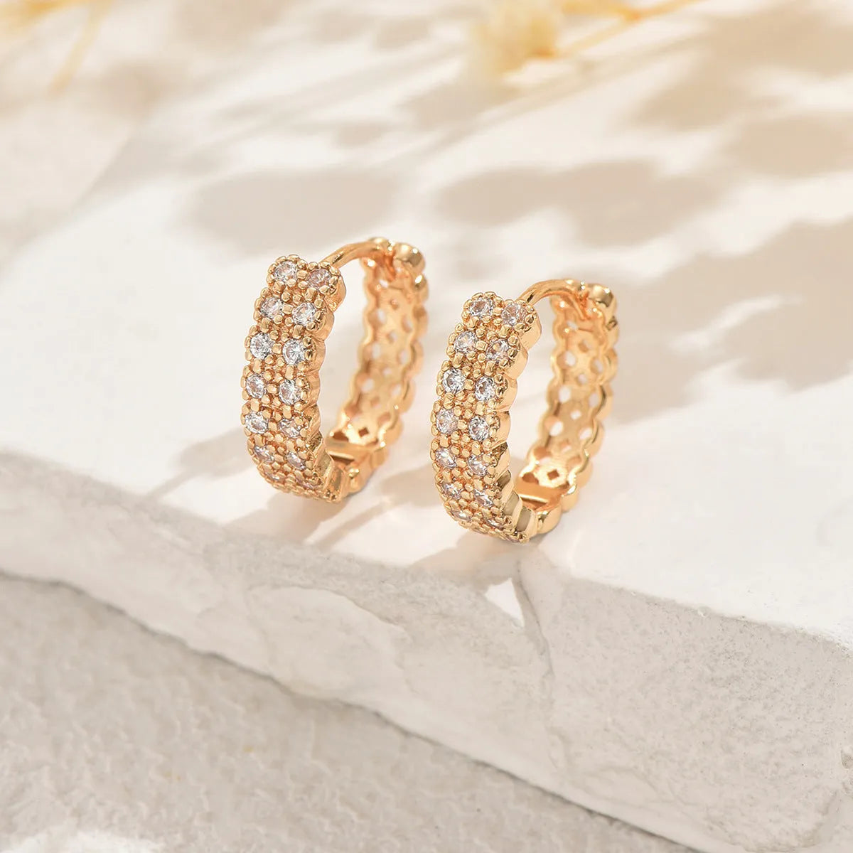 Copper geometric pattern ear studs with round dot ring elements in DE20288 colour