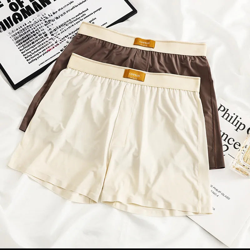 Pack of three pairs of men's solid colour ice silk underwear in loose fit.