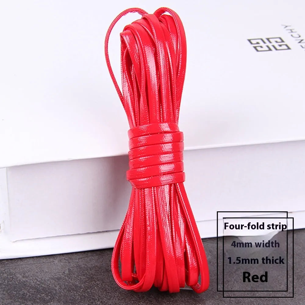 Rolls of soft PU leather weaving cord in various colours and widths for craft projects.