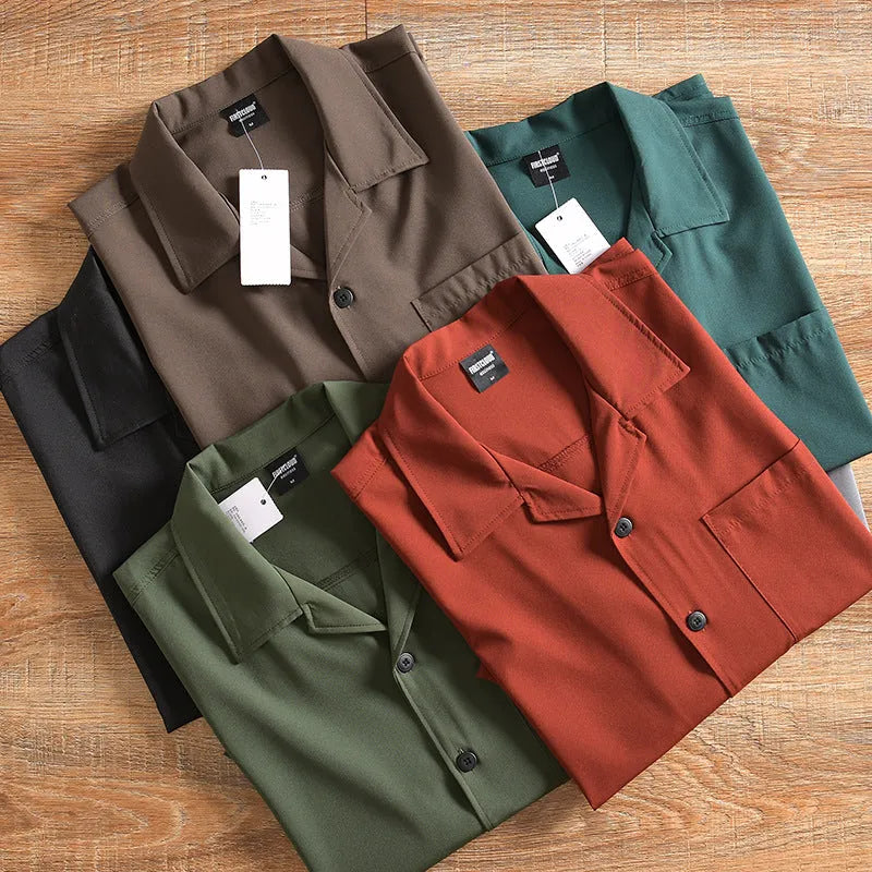 Men's loose fit short sleeve shirt in polyester cotton fabric, shown in army green colour