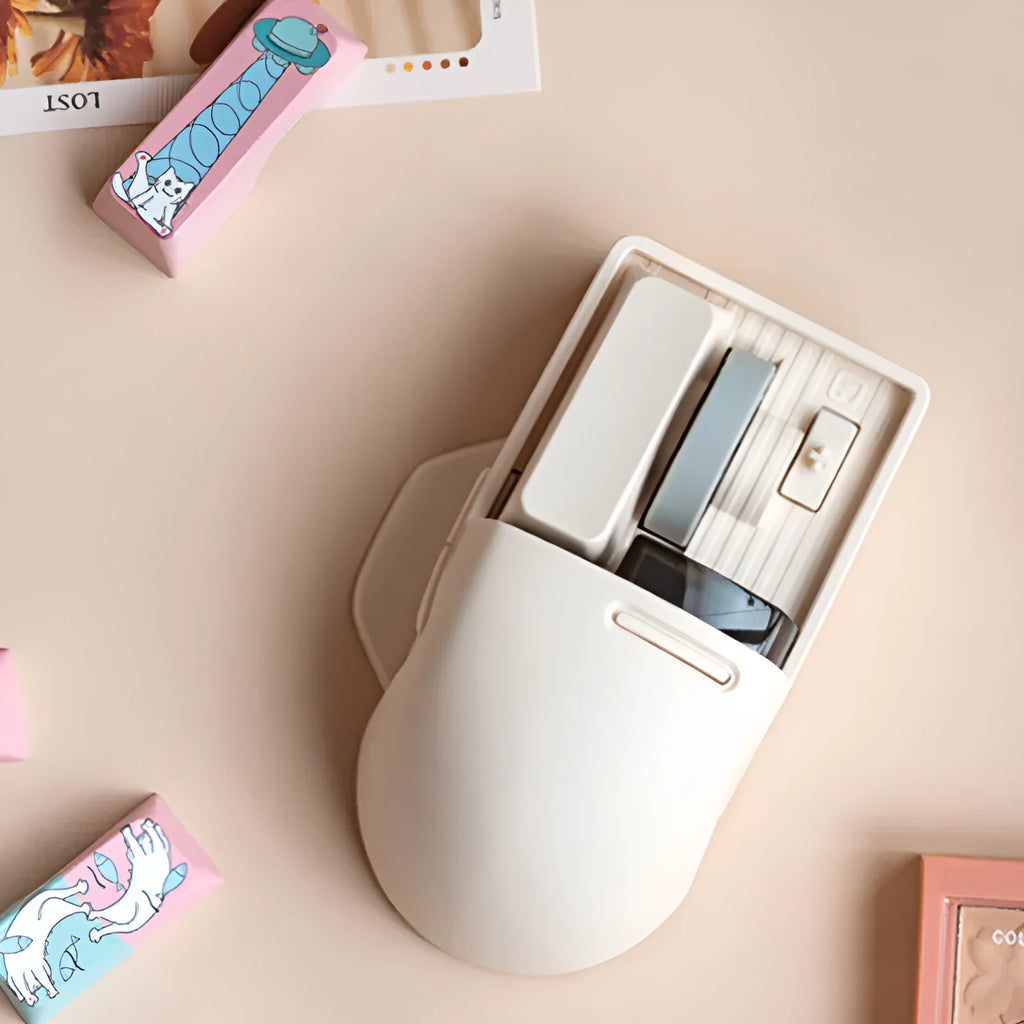 Xiaoqiao Tofu coloured wireless mouse with seven buttons and four way roller on mouse pad