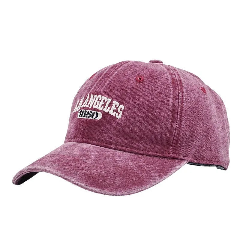Retro personalised embroidered peaked cap in acrylic fabric with adjustable fit and distressed lettering