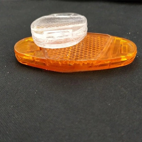 Bicycle spoke reflector set showing four plastic units in yellow colour with dimensions 7.2cm by 3.5cm