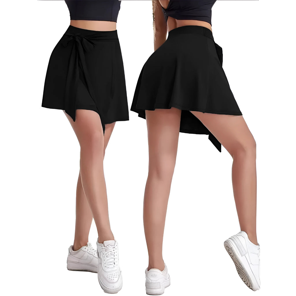 Black thigh-length unisex sports skirt with high waist and built-in shorts, laid flat.
