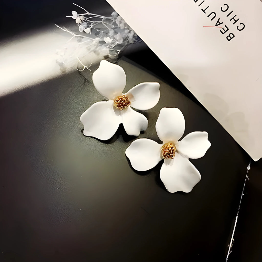 Women's flower stud earrings in pink and white colour options with electroplated alloy construction