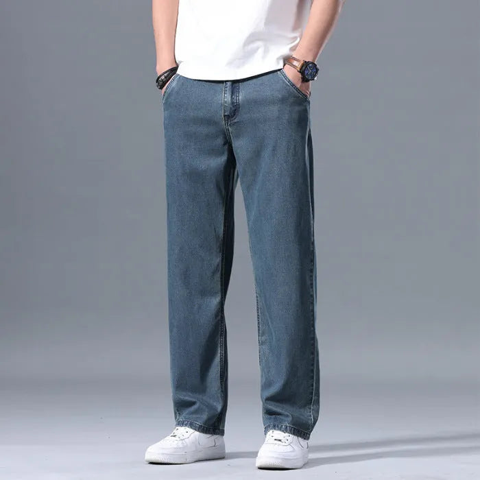 Men's loose straight-leg lyocell jeans in light blue with zipper fly closure