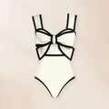 Women's black one-piece swimsuit with attached beach dress featuring a round skirt and bow detail.