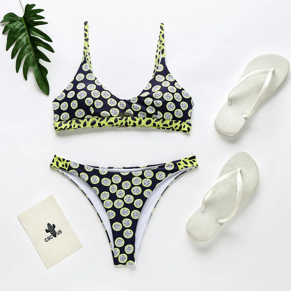 Women's bikini swimsuit in black and white dot pattern and red and white stripe option.
