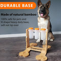 Natural wood colour dog puzzle toy and snack dispenser measuring 31 by 30 by 20 centimetres.