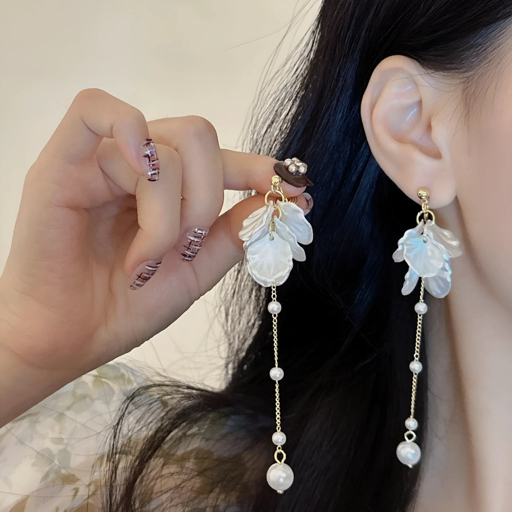 Women's acrylic shell pearl tassel earrings showing 8.8cm length and four fastening style options