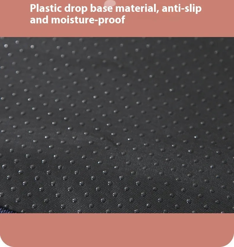 Removable washable sponge dog mat in brown, available in multiple sizes on a wooden floor.