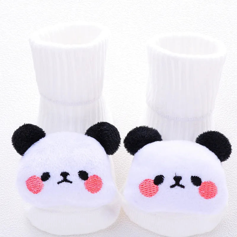 Cotton baby floor socks in various patterns including animal prints, stars, and bows for infants aged 0-3 months