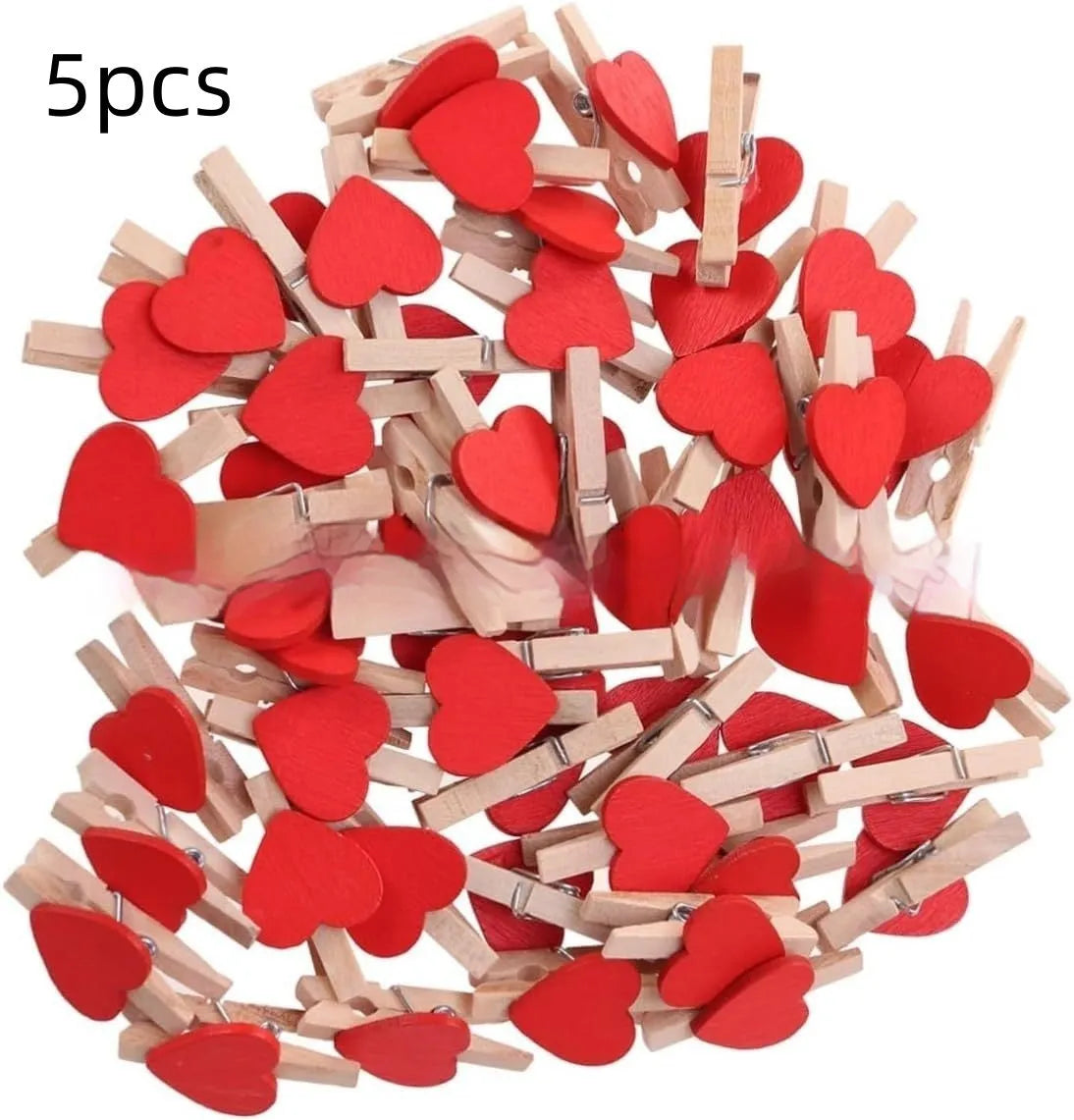Five small solid wood heart-shaped clips in different colours showing handmade craft details