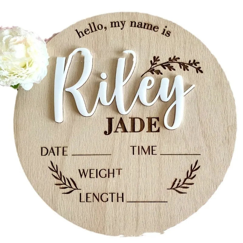 Square wooden baby name plaque showing newborn birth information, 15cm on each side.